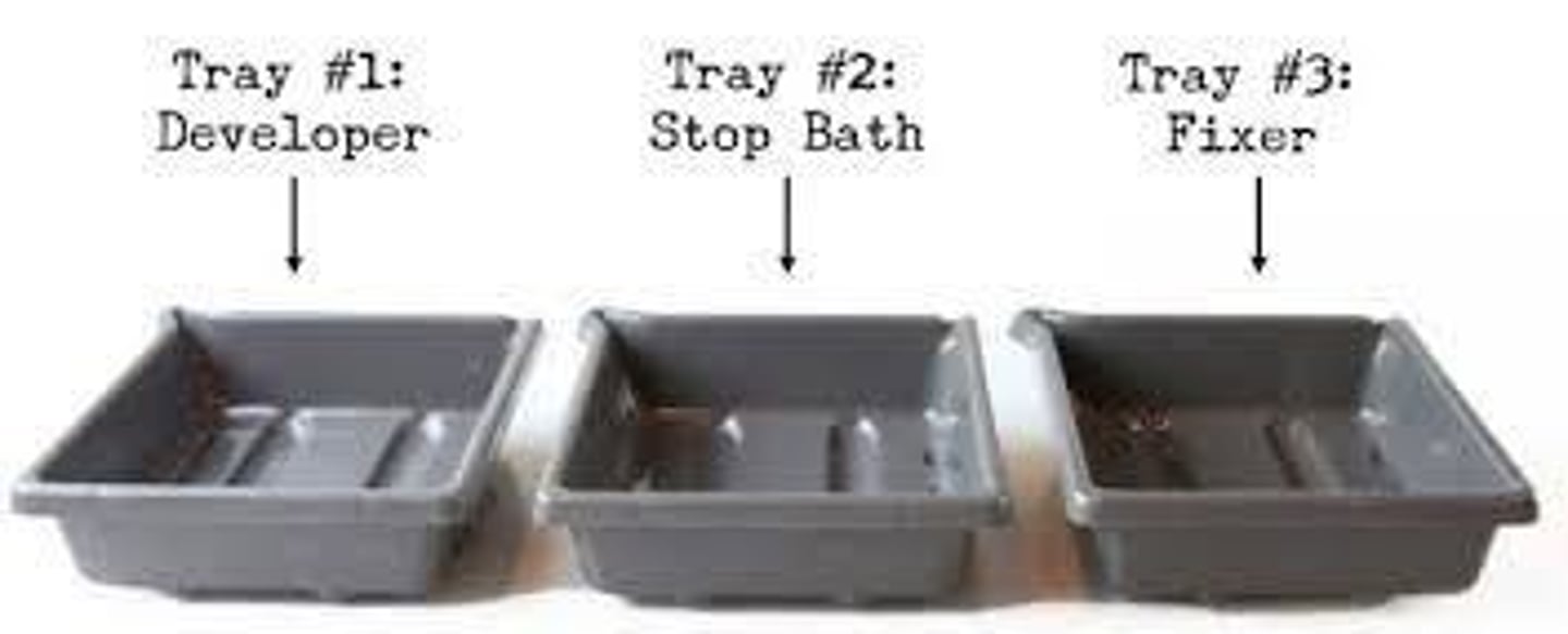 <p>Developer, Stop Bath, and Fixer.</p>