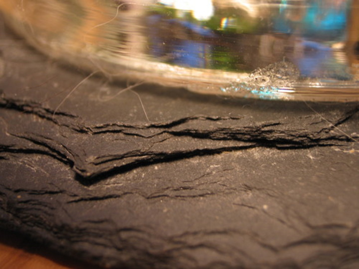 <p>Metamorphic Rock</p><p>Color: varies</p><p>Streak:</p><p>Layers: breaks in layers</p><p>Texture: fine grained, minerals not visible</p><p>Shiny:</p><p>Hardness:</p><p>Other:</p><p>low-grade metamorphic rock, made up of mica</p>