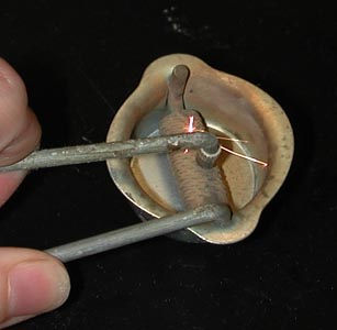 <p>metal striker</p>