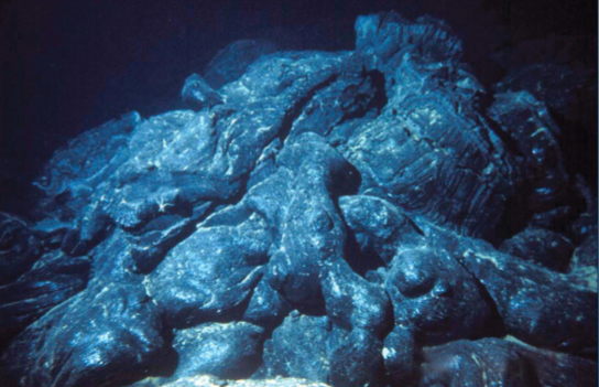<p><span>At mid ocean ridges, rock is</span></p>