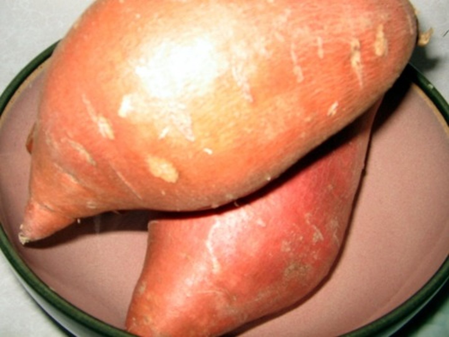 <p>The male native Ibo farmers in the novel grow this as their major food crop.</p>