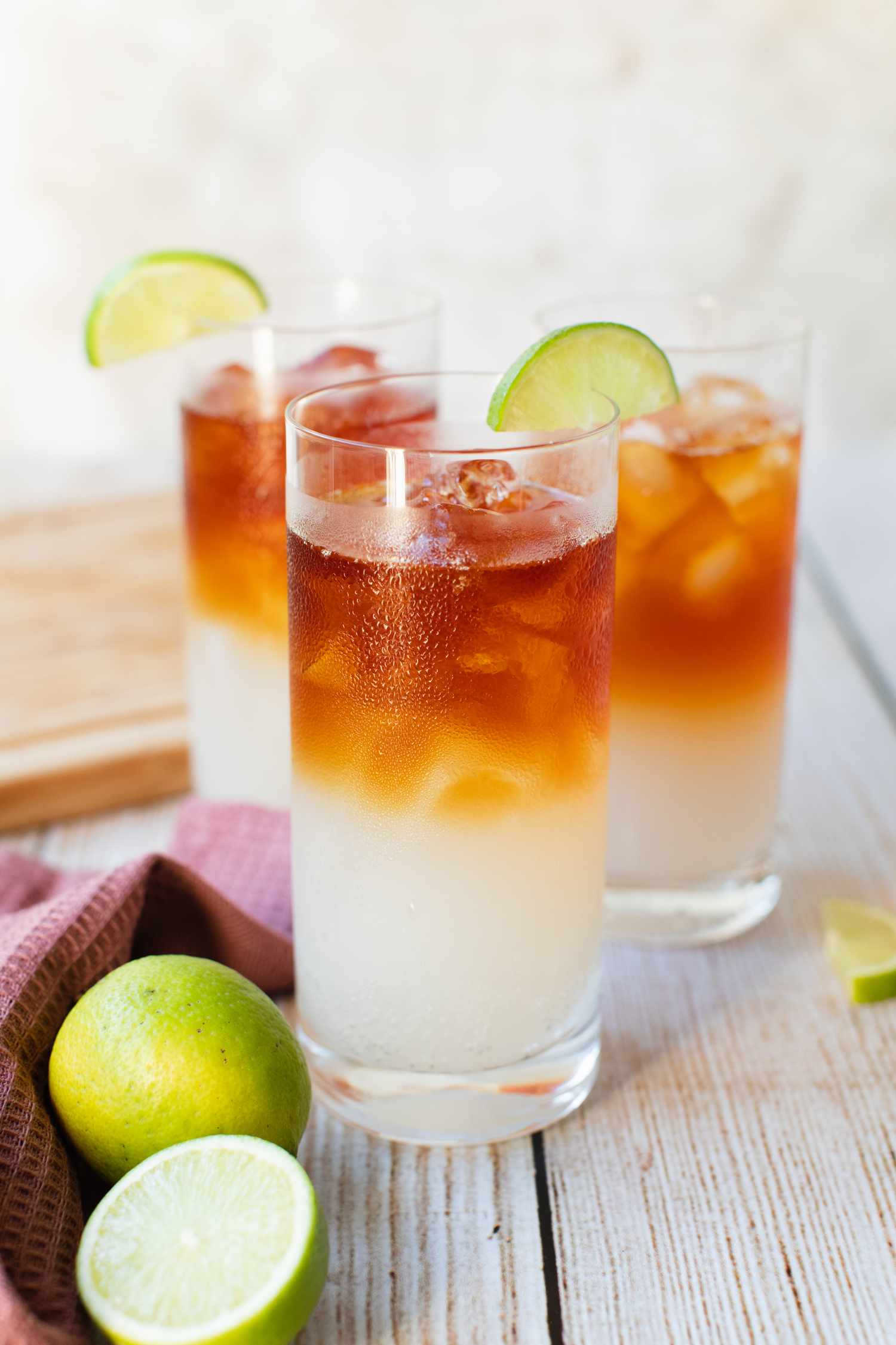 <p>highball, 1.5 oz dark rum, 4 oz ginger beer, 0.25 oz lime juice, served in a Collins, garnished with lime</p>