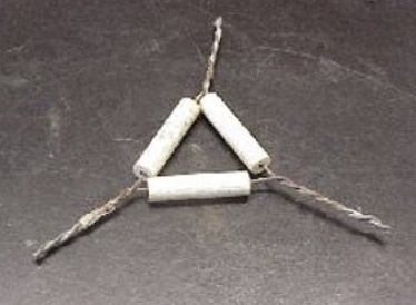 <p>used as a support for porcelein crucibles when being heated over a Bunsen burner</p>