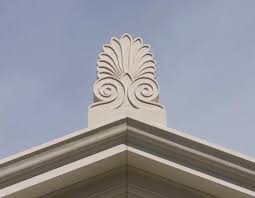 <p>decorative ornaments placed at the apex and corners of pediment</p>