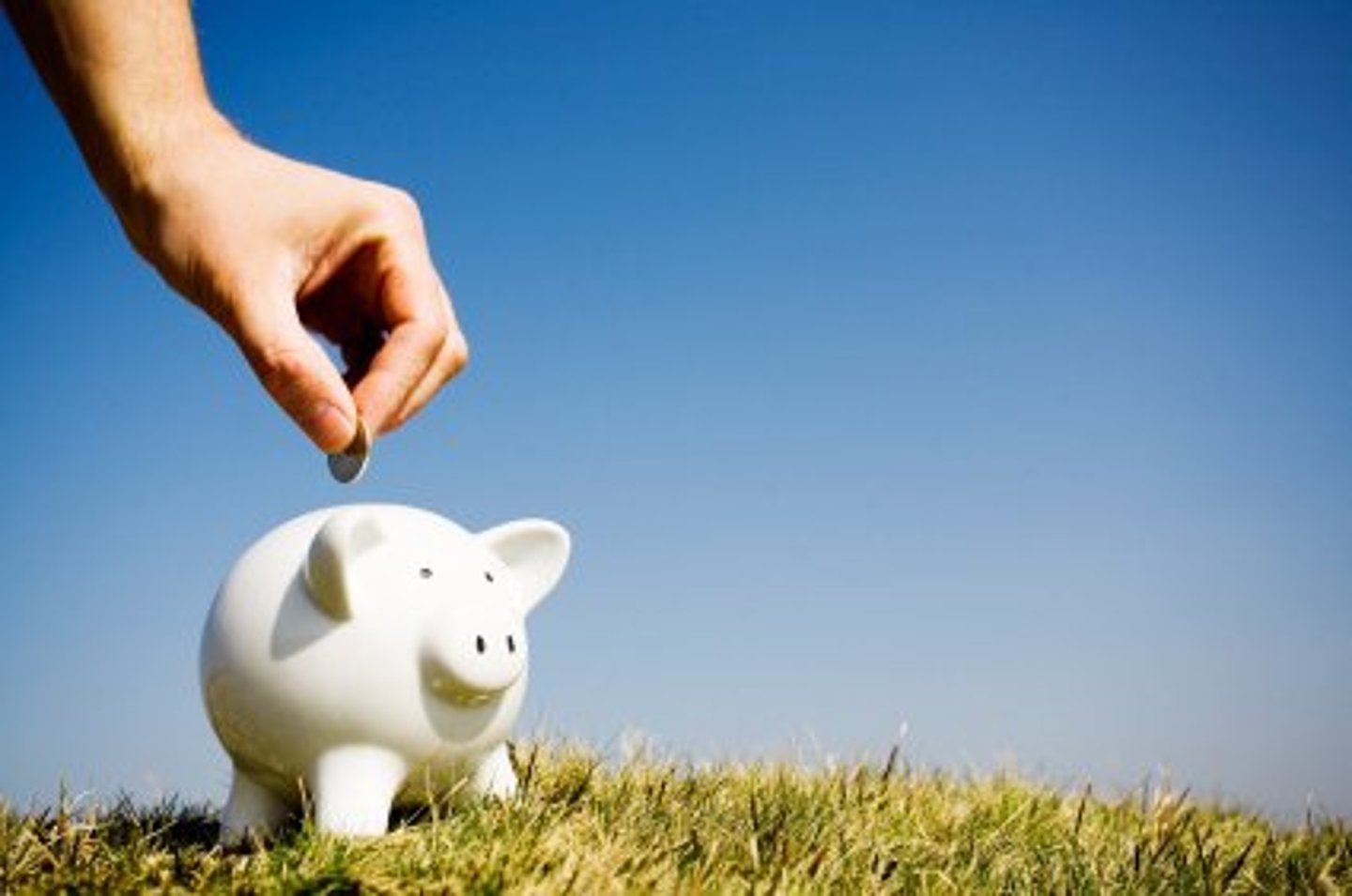 <p>to keep value when held onto or stored instead of spent</p>