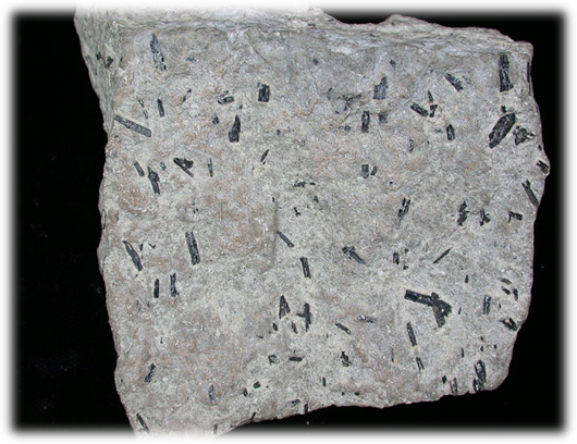 <p><span style="font-size: 12.8px; font-family: lato, sans-serif">igneous rock with porphyritic texture and intermediate composition</span></p>