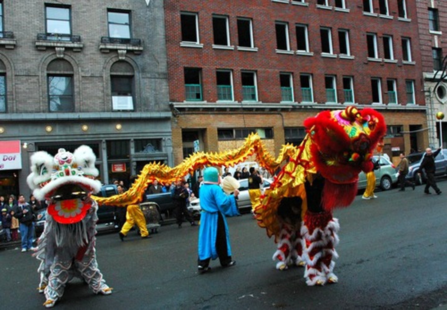 <p>Cultural Diffusion</p><p>Why? The image shows a Chinese New Year celebration in a city located in a country outside of China. Ethnic Chinese living in the city are celebrating their cultural traditions, which provides evidence of cultural diffusion.</p>