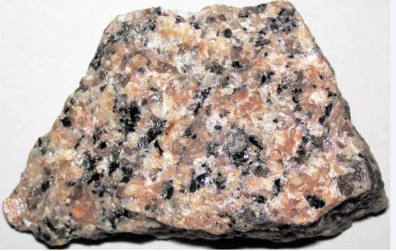 <p>light rock that has crystals large enough to be seen with the naked eye</p>