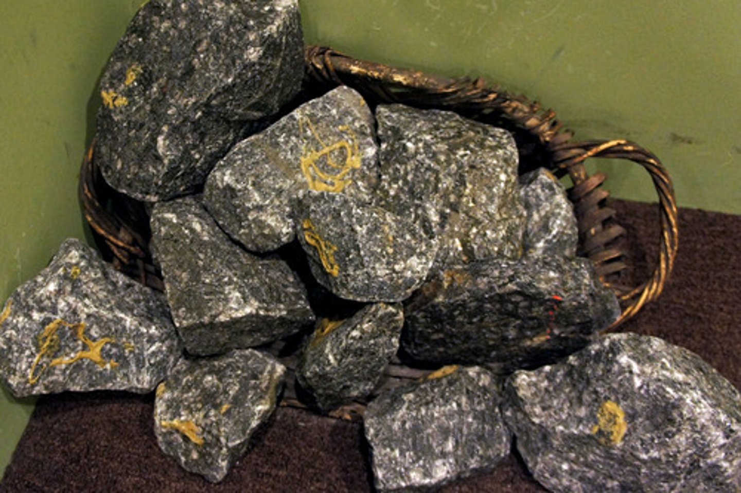 <p>The desired mineral resource that is in its raw form, often mixed with surrounding materials</p>