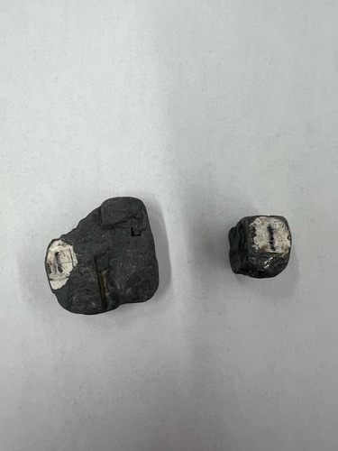 <ul><li><p>Dark Grey</p></li><li><p>Metallic</p></li><li><p>3 planes of cleavage at 90 degrees</p></li><li><p>Hardness: 2.5</p></li></ul>