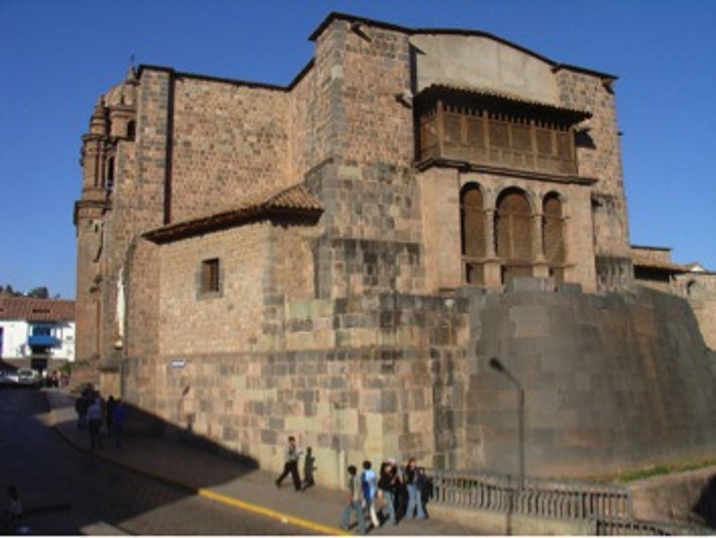 <p>Curved Inka wall of Qorikancha with Santo Domingo</p>