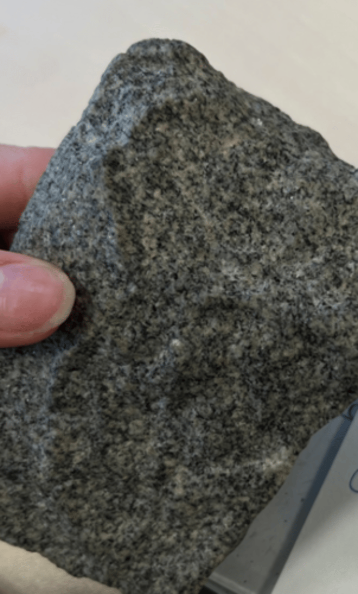 <p>intrusive igneous rock, felsic<br>essential minerals: quartz, feldspar and minor parts of mica<br>texture is phaneritic <br>Durable, strong, unique and hard</p>