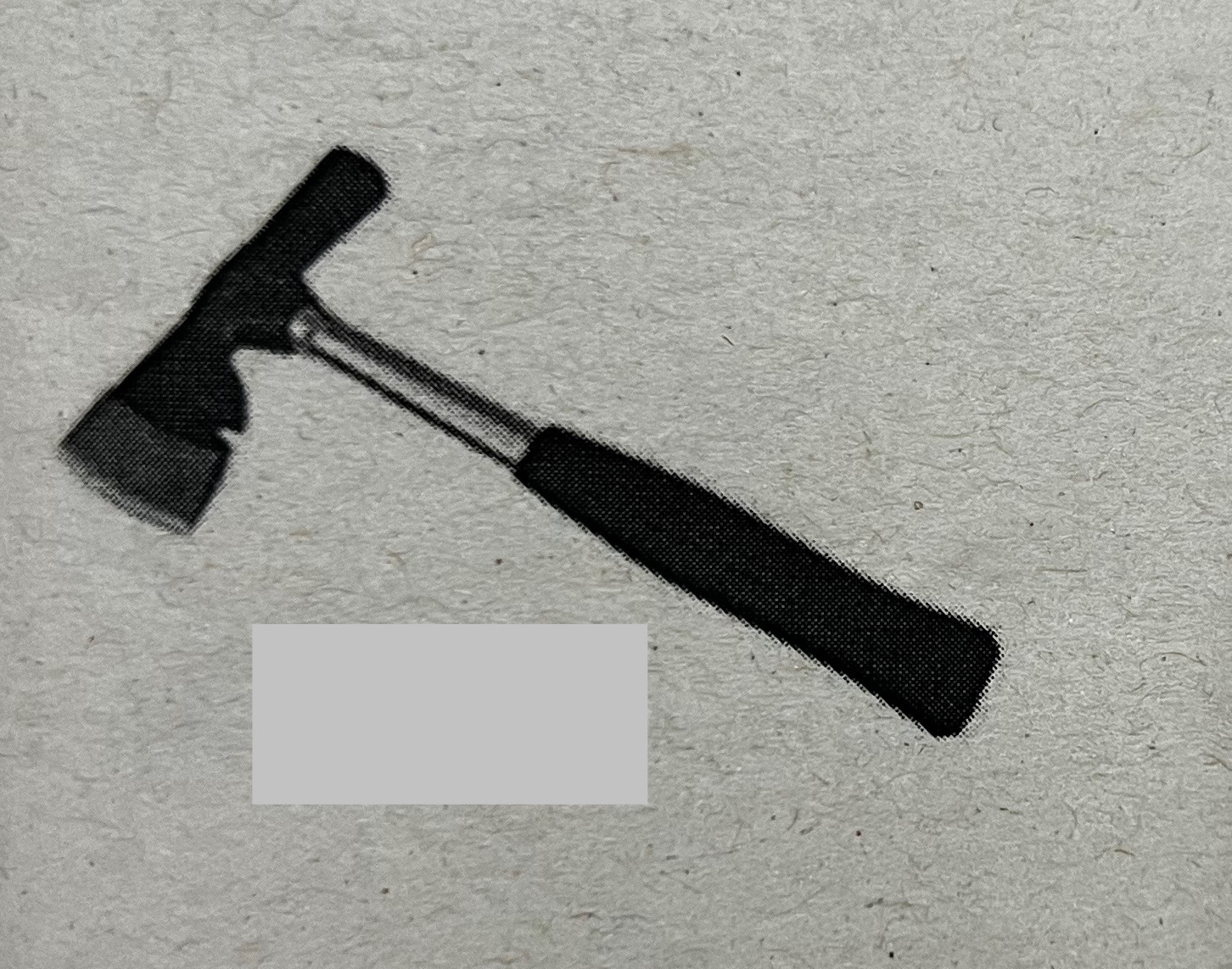 <p>Has a flat square face on one side and sharp axe like knife on the other. Not a heavy duty hammer but is often used to chop small wood</p>