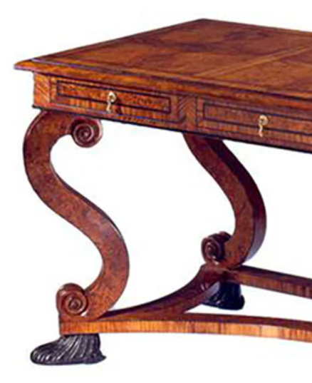 <p>Carved leg shaped like large letter S</p>