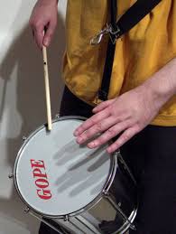 a high pitched, double headed drum that provides the calls that cue the entrances of the other percussionists