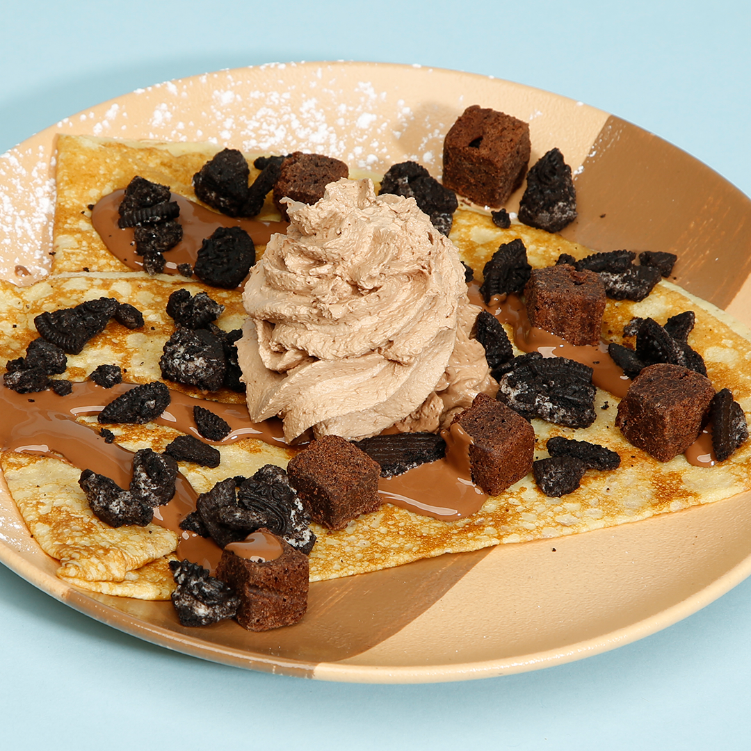 <p></p><ul><li><p>Chocolate whip cream</p></li><li><p>Fudge brownies</p></li><li><p>Milk chocolate sauce</p></li><li><p>Oreo cookie pieces</p></li></ul><p></p>