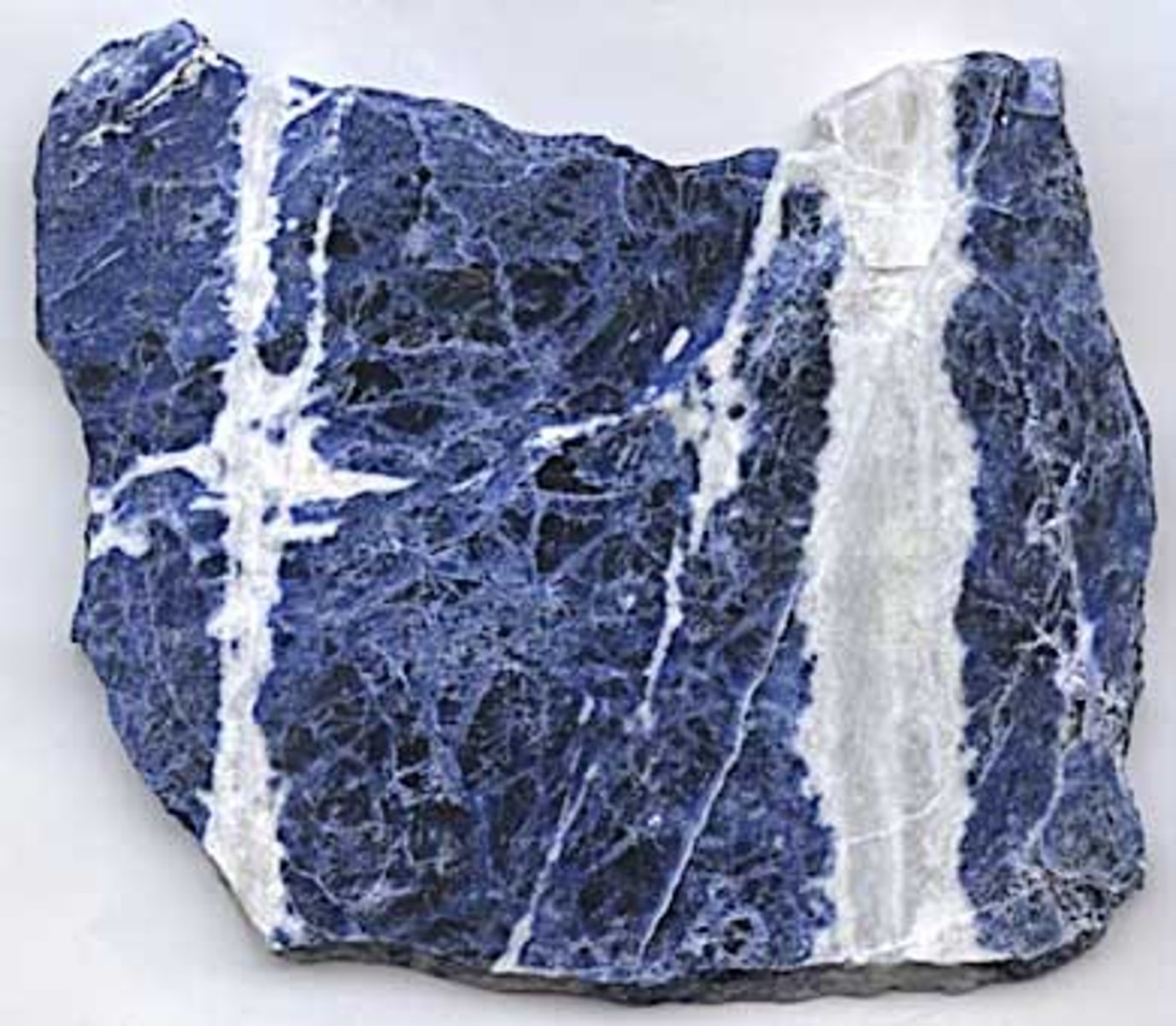 <p>Always blue, but usually a very dark, mottled blue. Colorless streak.</p>
