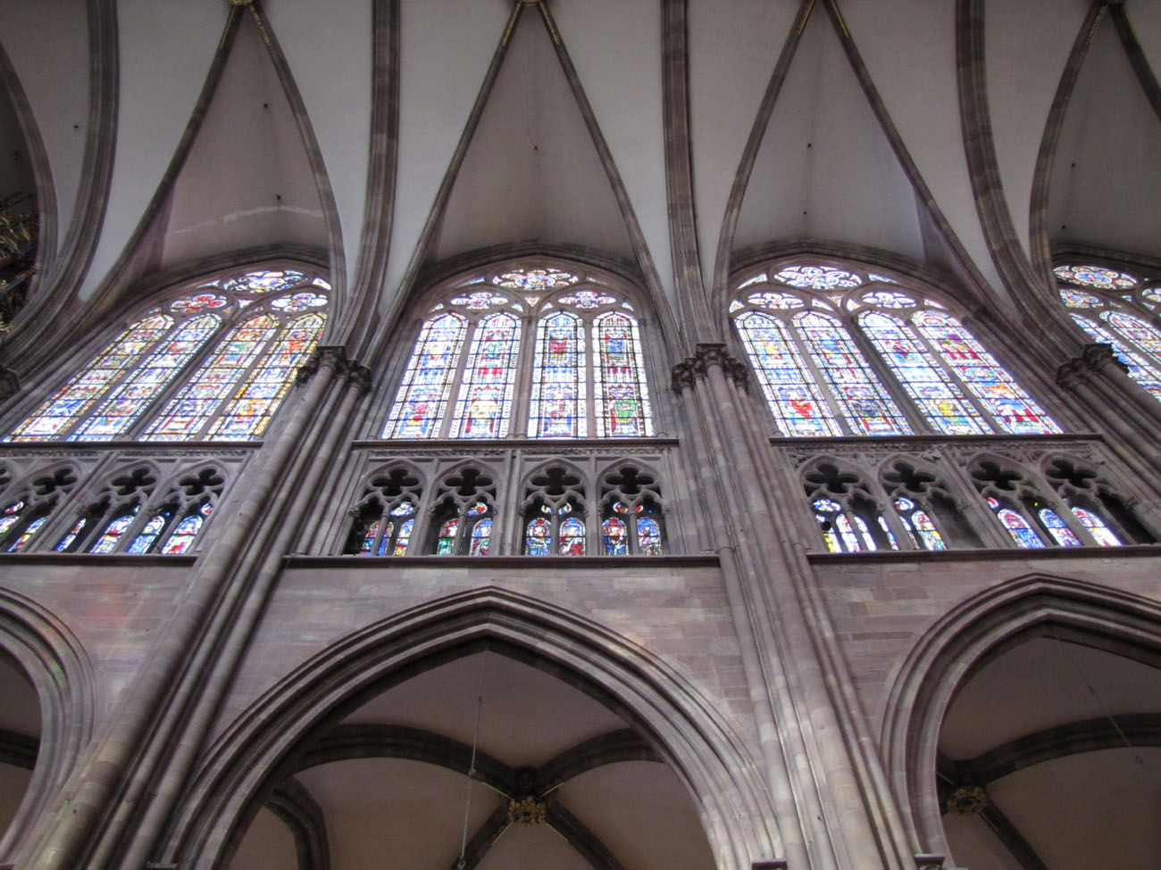 <p>A high section of wall that contains windows above eye level, allowing natural light to illuminate the interior of a building, commonly found in churches. </p>