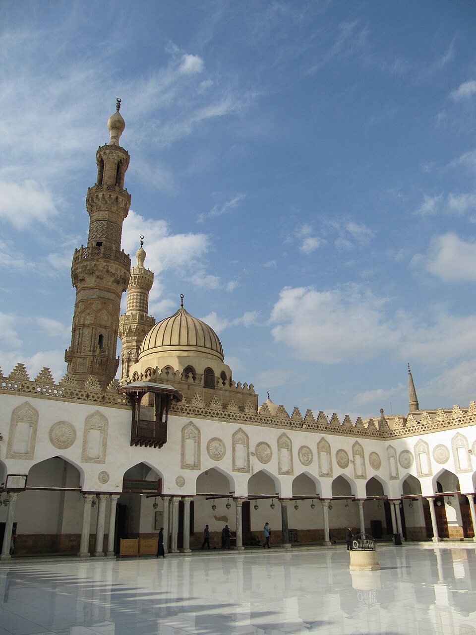 <ul><li><p>Built in Cairo during the reign of Al-Mu'izz li-Din Allah of the Fatimid Caliphate</p></li><li><p>Served as both a mosque, a university, and a palace</p></li><li><p>It became the center of Muslim learning in the world  </p></li></ul><p></p>