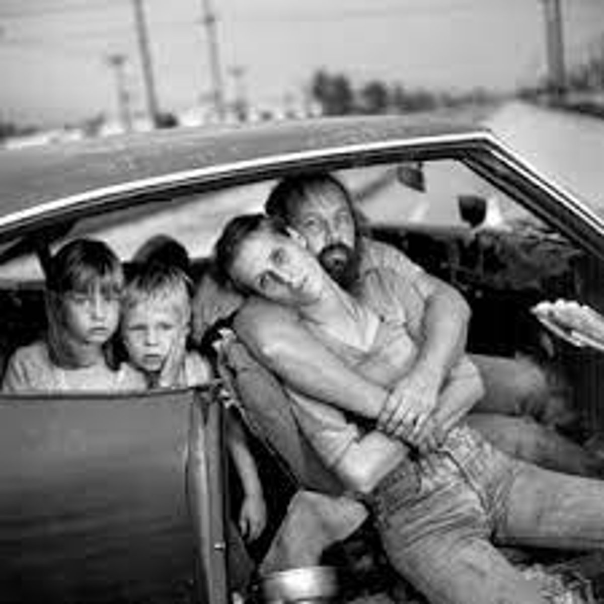 <p>The Damn Family in Their Car</p>