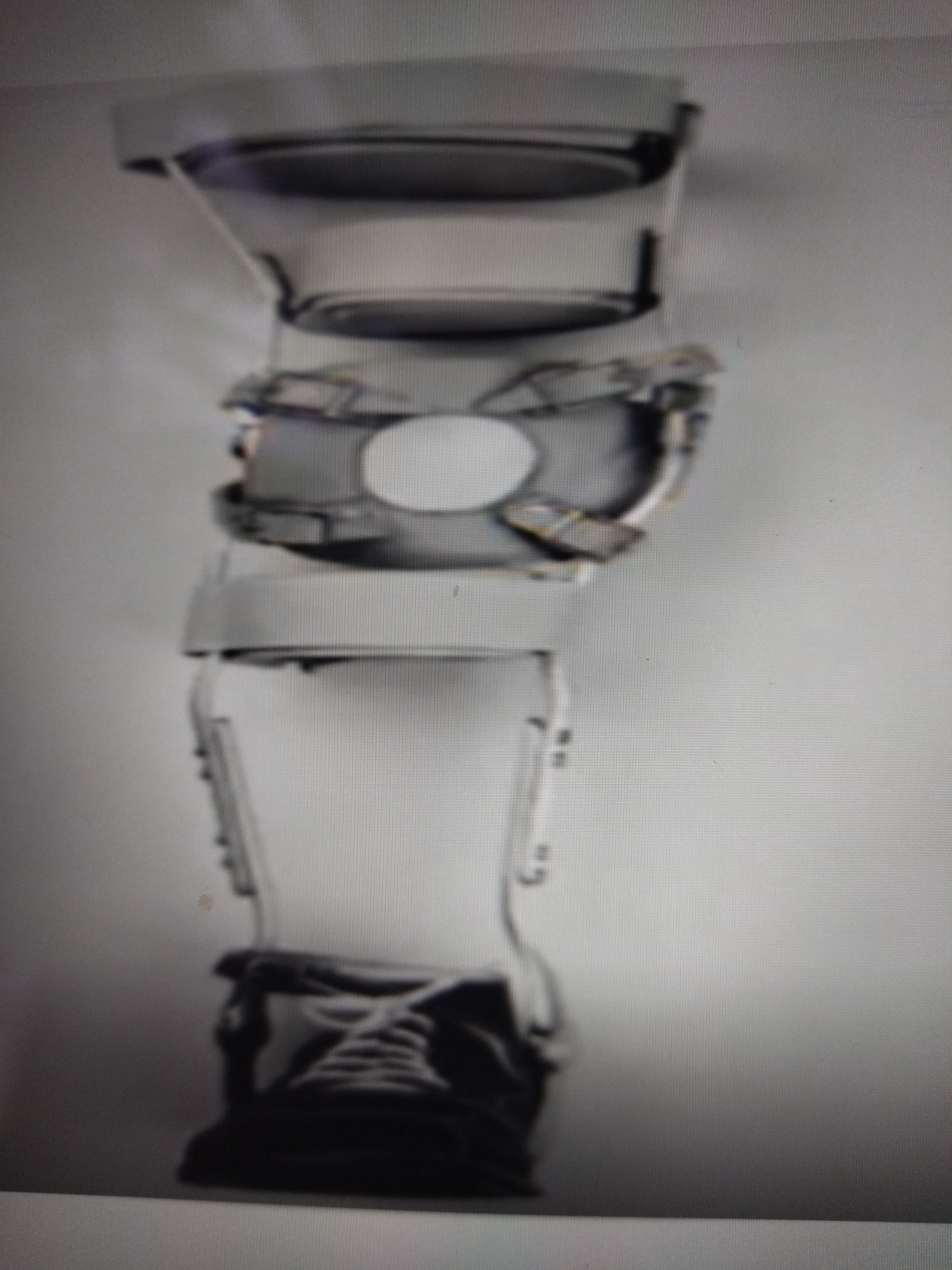 * Aka Anterior Band
* Anterior to knee secured to uprights of the straps