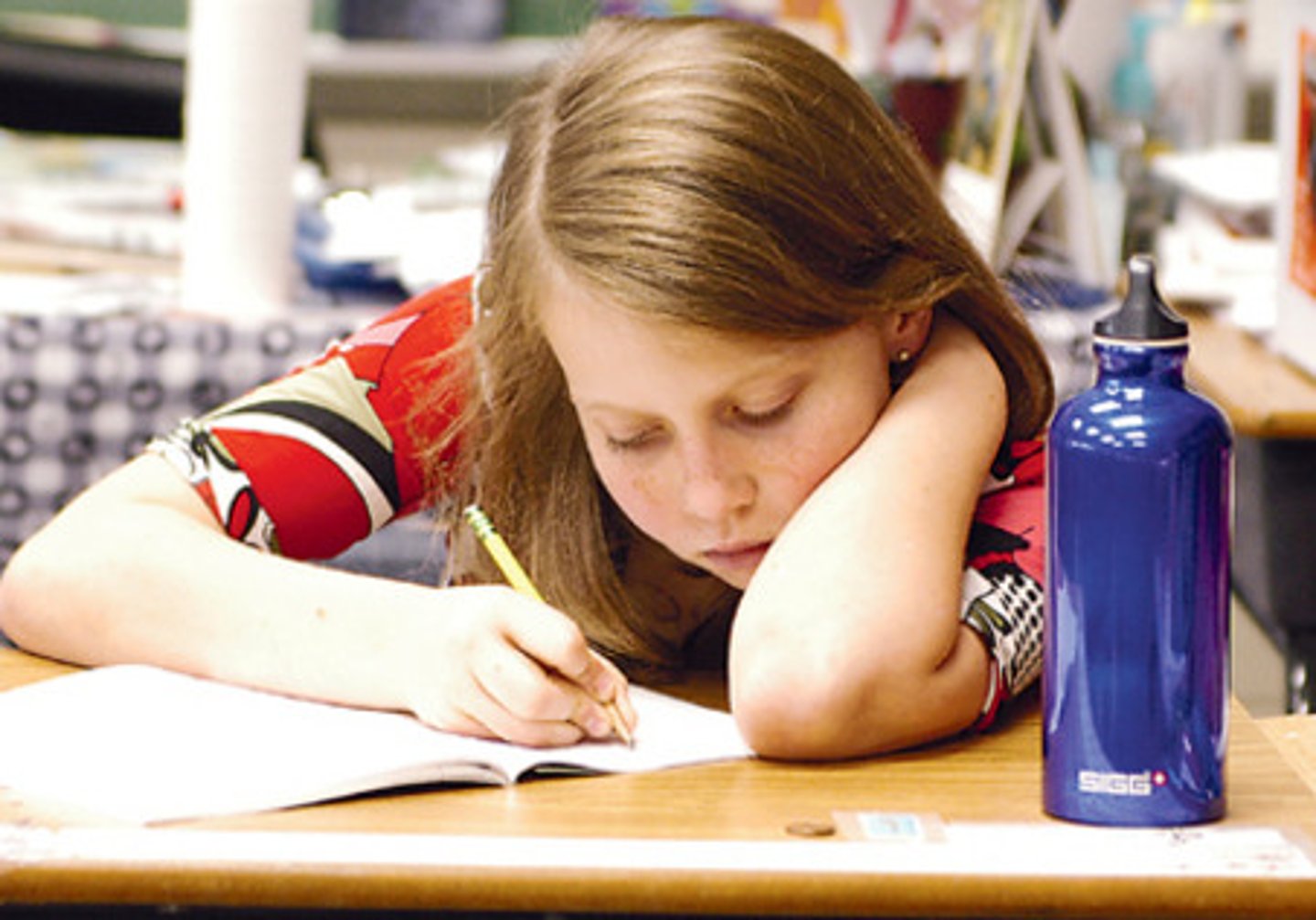 <p>She wrote her homework.</p>
