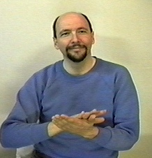 <p><span>placing your left hand in front of you, palm up and moving the flat palm of your right hand across your left hand. double motion</span></p>