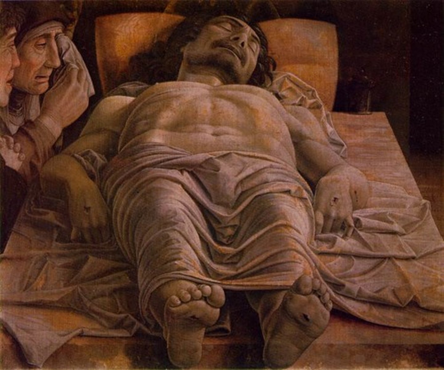 <p>Linear perspective is shown in the foreshortening of the figure. Orthogonals are on either side of Christ's body and the figure is protruding towards the viewer pushing into space, creating the foreshortening and 3D effect.</p>