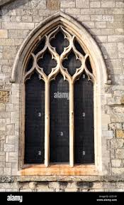 <p><span>The delicate, decorative stone stonework inside a window that holds the stained glass in place</span></p>
