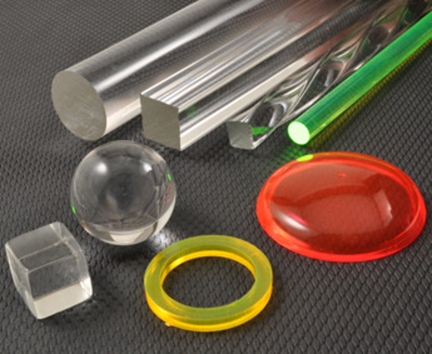 <p>- Popular brands are "LUCITE" and "PLEXIGLASS"</p><p>- transparency of glass (but not scratchproof quality) with shatterproof quality</p><p>- Used principally for skylights, skydomes, paints, safety adhesives, finish hardware, &amp; lighting fixtures</p>