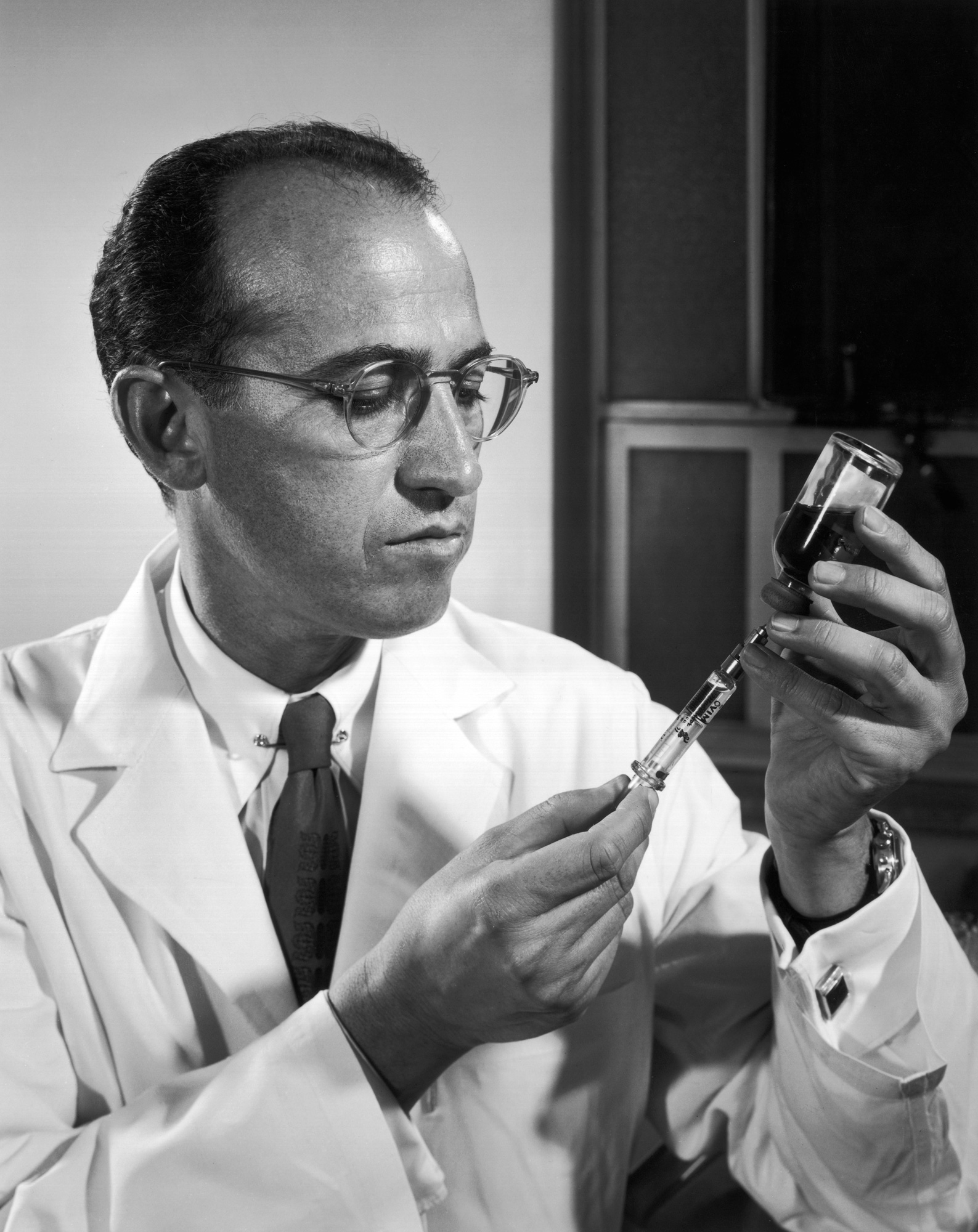 <p>An American virologist(<span>scientist who studies viruses)</span> who developed the first successful polio vaccine in the 1950s, contributing significantly to the fight against the disease. His work led to the near eradication of polio in many parts of the world. <span style="color: #000000"><mark data-color="#ffffff" style="background-color: #ffffff; color: inherit">He hoped for everyone to have access to the vaccine </mark></span></p>