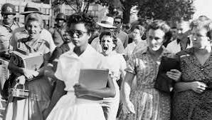 <p>Elizabeth Eckford</p><p>an angry mob</p>