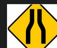 Warning sign: Road narrows ahead sign

\
