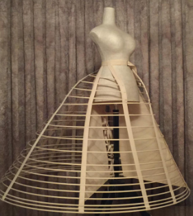 <p>wide-hoopskirt of the Victorian period</p>