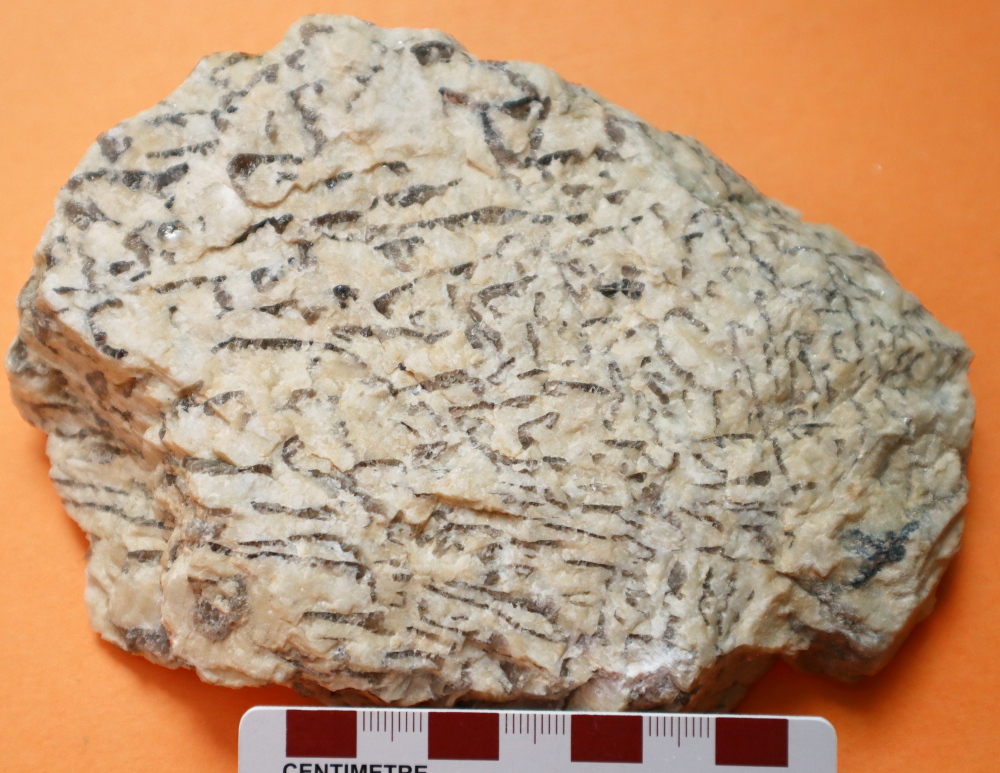<p>-igneous</p><p>-plutonic</p><p>-pegmatitic</p><p>-felsic</p><p>-K-feldspar, quartz, Na-plagioclase</p><p>-formed at the end of Bowens reaction series</p><p>uses: construction </p><p></p>