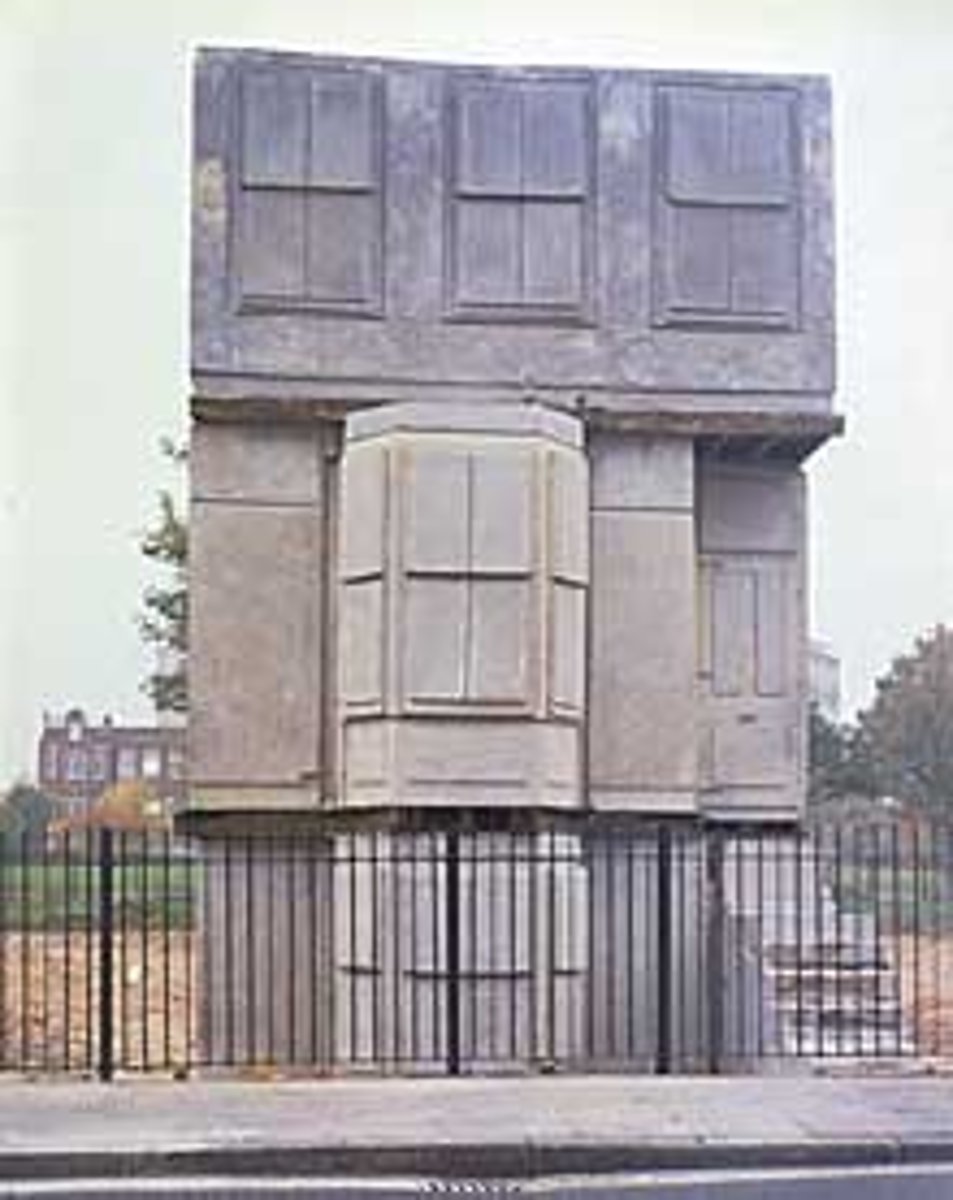 <p>Rachel Whiteread</p><p>1993</p><p>Identity, the Body and Politics</p><p>Artist: Whiteread awarded the Turner Prize.</p><p>Commissioner:</p><p>Original Location: London, England</p><p>Style: Abstract Memorial. (Identity, the Body and Politics)</p><p>Characteristics: Plaster cast of Victorian British row house. Plaster cast, liquid concrete.</p><p>Subject: Victorian British row house about to be torn down.</p><p>Function: Victorian era homes were being torn down and apartment blocks were replacing it. Urban development didn't serve the community that was living there for generations. (Something gone no longer inside).</p>