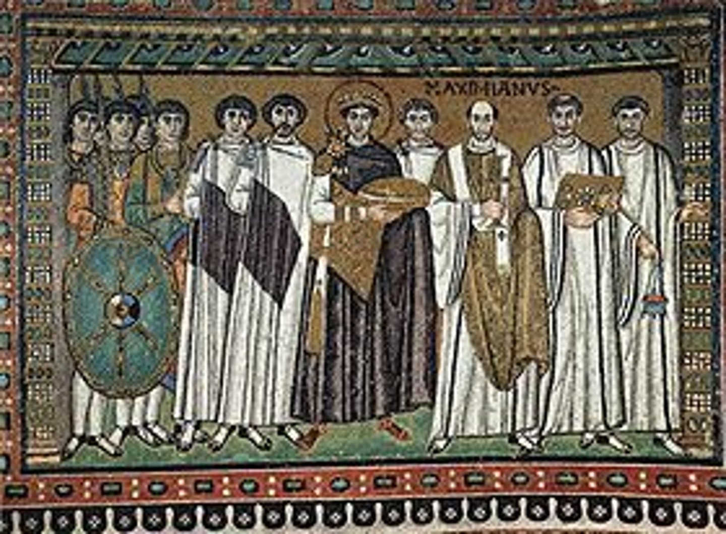 <p>- mosaic</p><p>- RHS: clergy</p><p>- LHS: military + state officials</p><p>- shows Justinian as religious, military + political authority</p><p>- figs create symmetrical comp.</p><p>- Justinian robed in purple+gold, bearing halo --&gt; shows his semi-divinity + royalty</p><p>- holds bowl for the Eucharist</p>