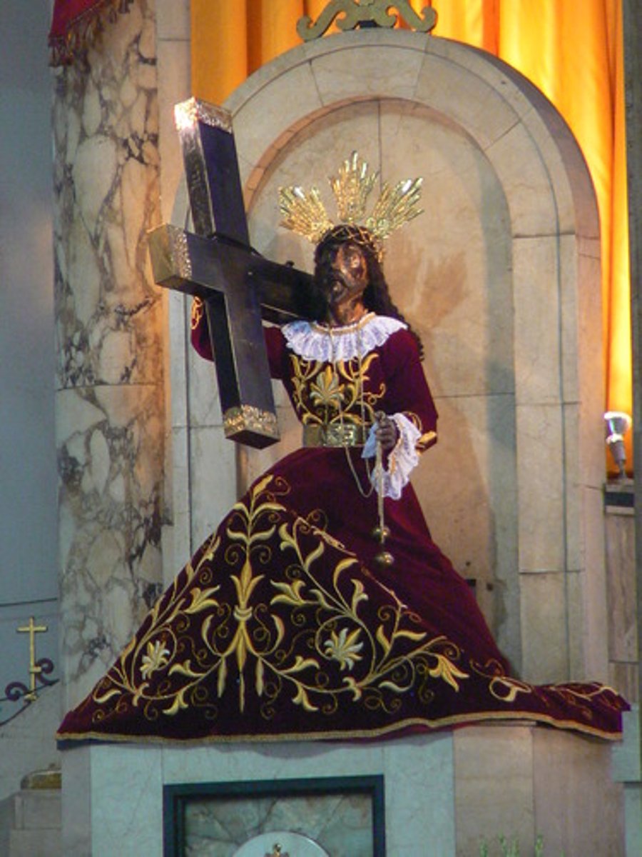 <p>It is a venerated, life-sized dark statue of Jesus Christ carrying the True Cross.</p>