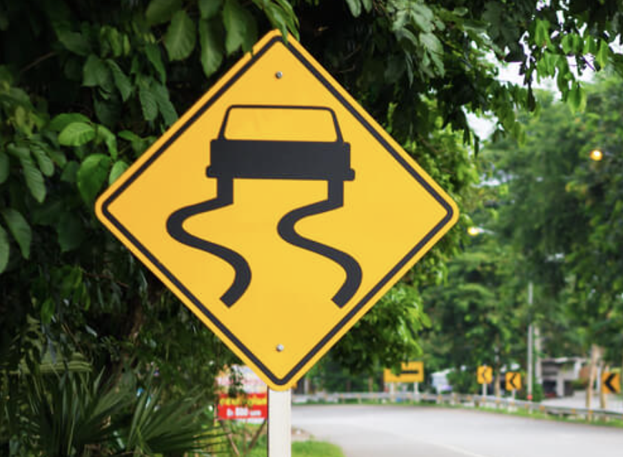 <p>This sign means the road may:</p>