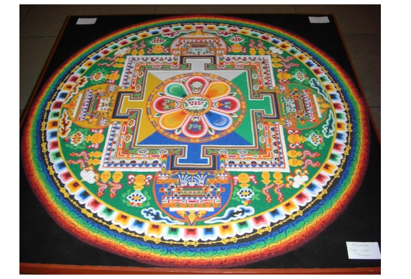 <p>In Buddhist art, a symbolic diagram of the cosmos in a circular shape. The creation of a mandala is used as a tool for re-consecrating the earth and its inhabitants and is often associated with meditation practices. </p>