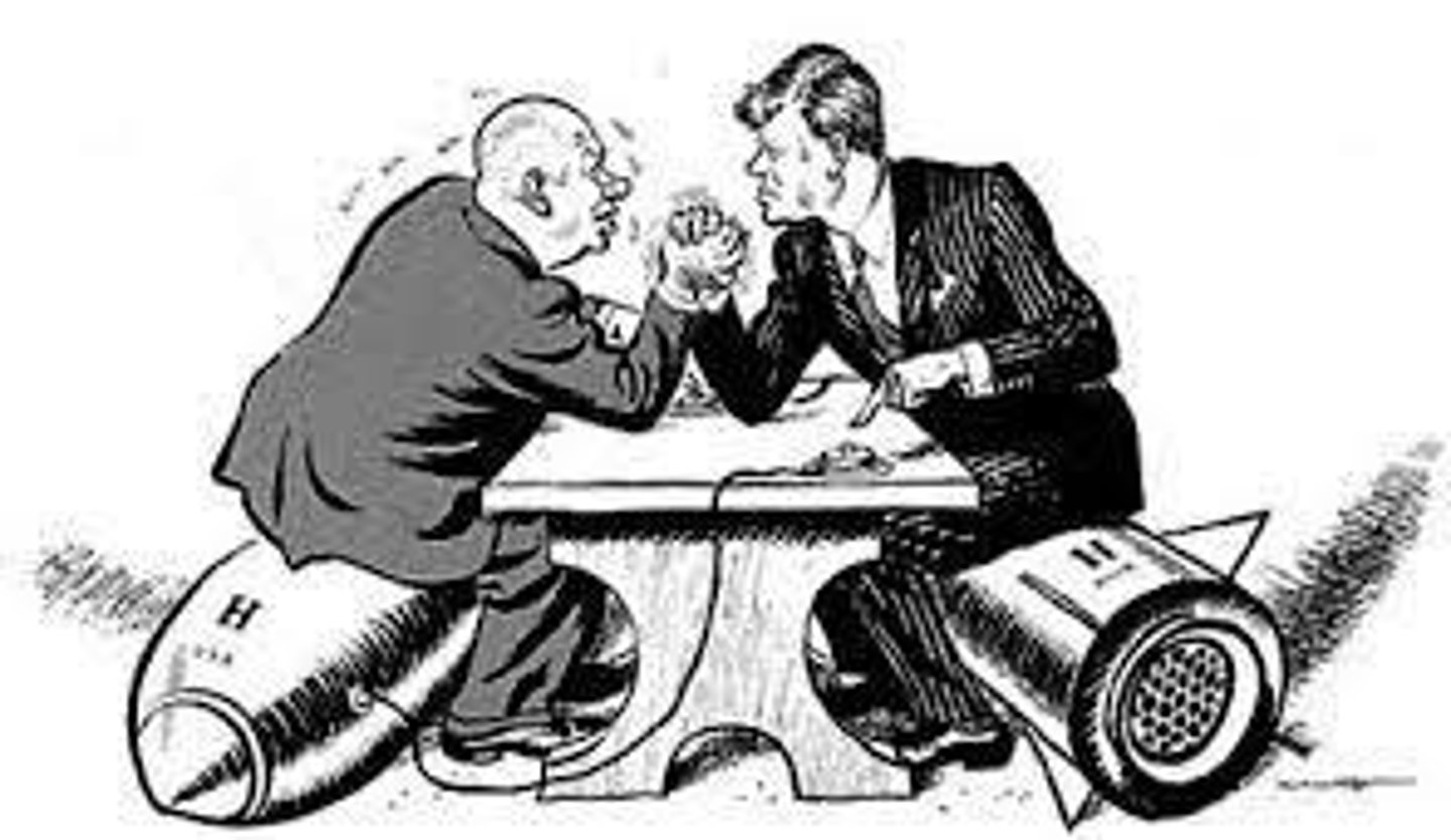 <p>The stockpiling and mass production of nuclear weapons by the US and USSR.</p>